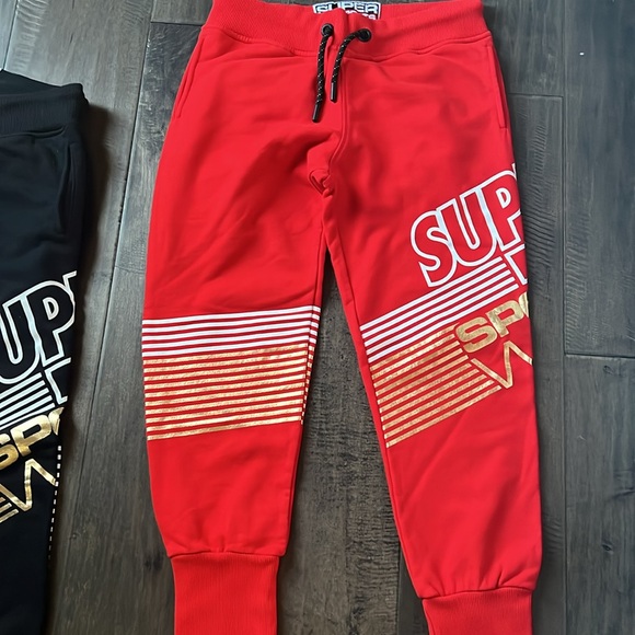 2 Superdry Joggers Red and Black with Gold size U.S. 8 - Picture 2 of 4